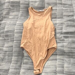 high neck tan bodysuit